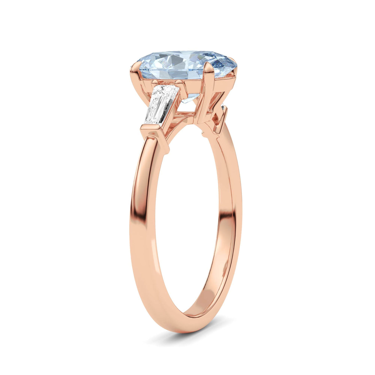 Rose gold Three-Stone Fancy Blue Oval Cut Diamond Ring with Tapered Baguette Side Stones