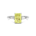 Yellow gold Three-Stone Fancy Yellow Radiant Cut Diamond Ring with Tapered Baguette Side Stones