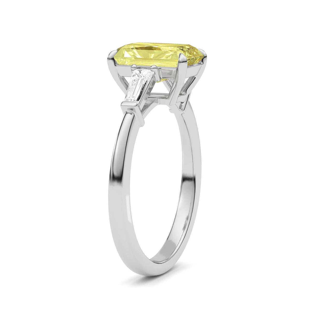 Yellow gold Three-Stone Fancy Yellow Radiant Cut Diamond Ring with Tapered Baguette Side Stones