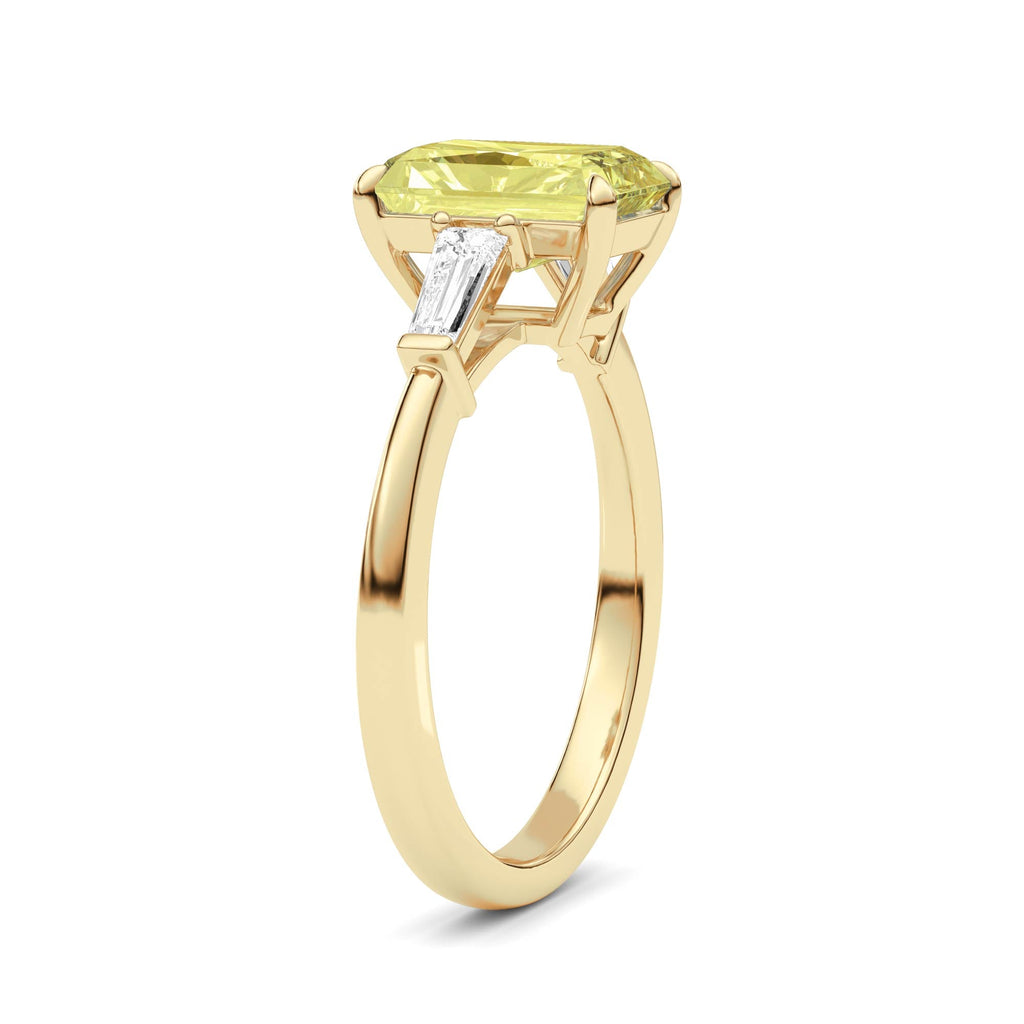 Yellow gold Three-Stone Fancy Yellow Radiant Cut Diamond Ring with Tapered Baguette Side Stones