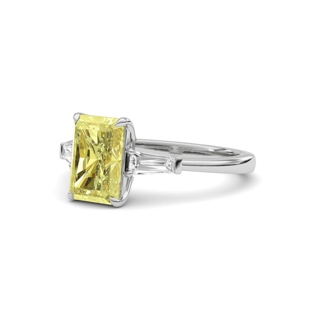 Yellow gold Three-Stone Fancy Yellow Radiant Cut Diamond Ring with Tapered Baguette Side Stones