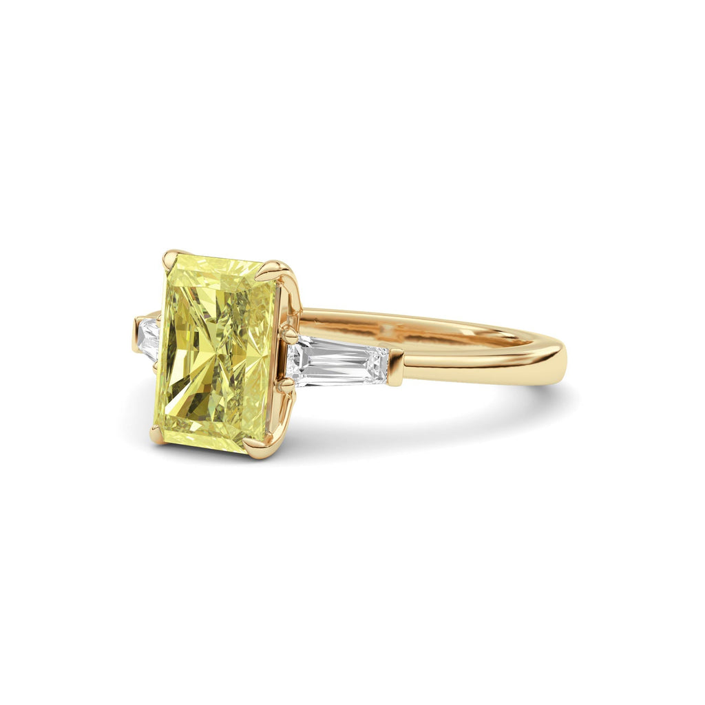 Yellow gold Three-Stone Fancy Yellow Radiant Cut Diamond Ring with Tapered Baguette Side Stones