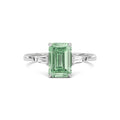 White gold Three-Stone Fancy Green Emerald Cut Diamond Ring with Tapered Baguette Side Stones