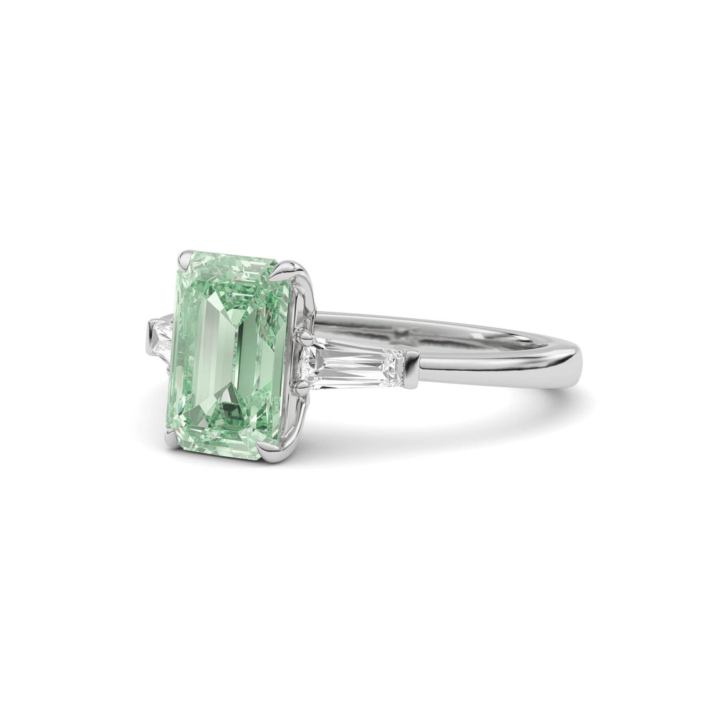 White gold Three-Stone Fancy Green Emerald Cut Diamond Ring with Tapered Baguette Side Stones