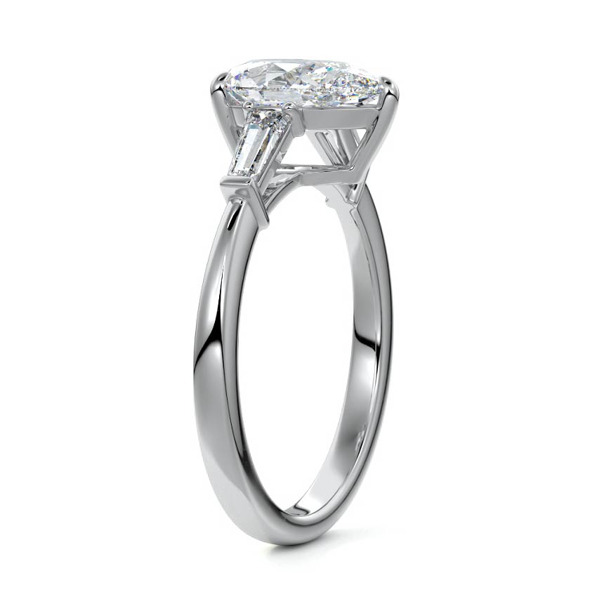 Silver Three-Stone Pear Diamond Ring with Tapered Baguette Side Stones