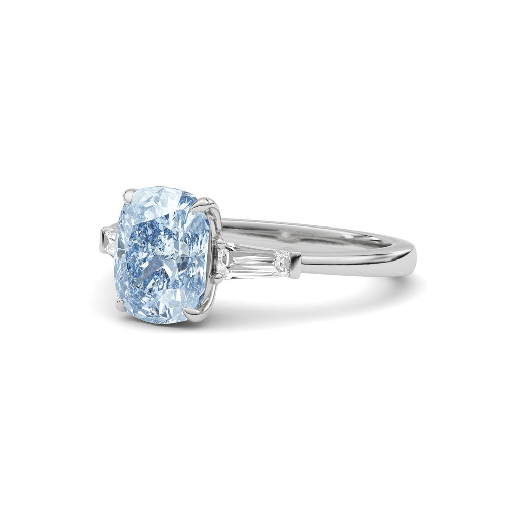 Silver Three-Stone Fancy Blue Cushion Cut Diamond Ring with Tapered Baguette Side Stones