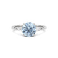 Platinum Three-Stone Fancy Blue Round Cut Diamond Ring with Tapered Baguette Side Stones