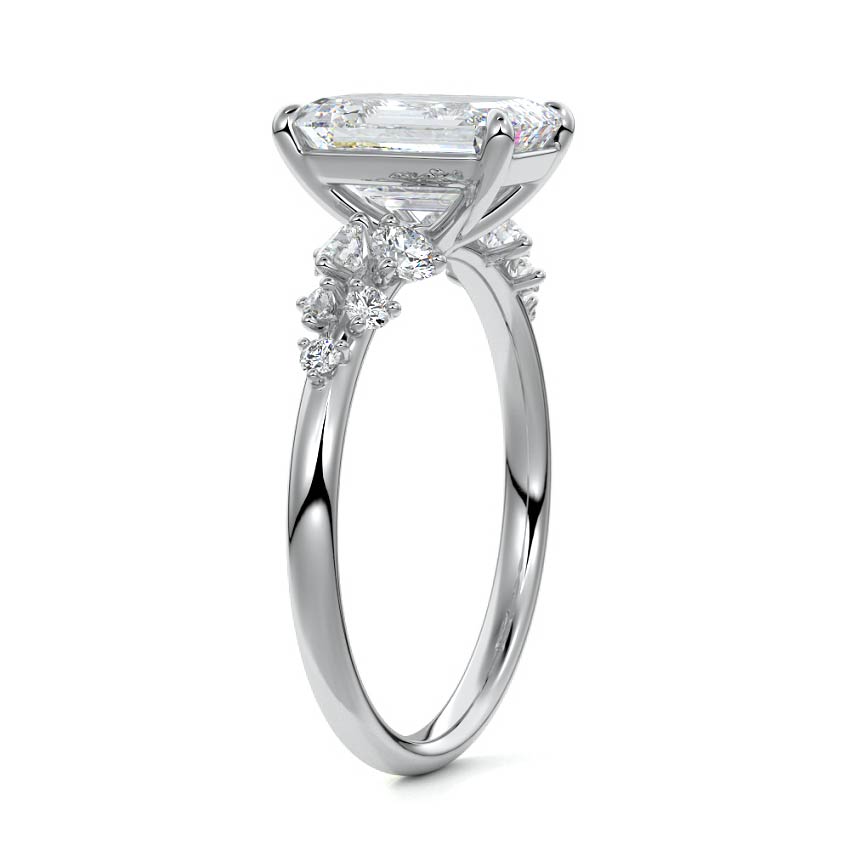 White gold Emerald Diamond Side Stone Engagement Ring with Round Floral Cluster Accents