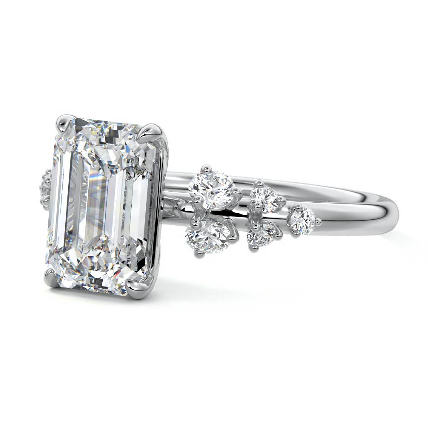 White gold Emerald Diamond Side Stone Engagement Ring with Round Floral Cluster Accents