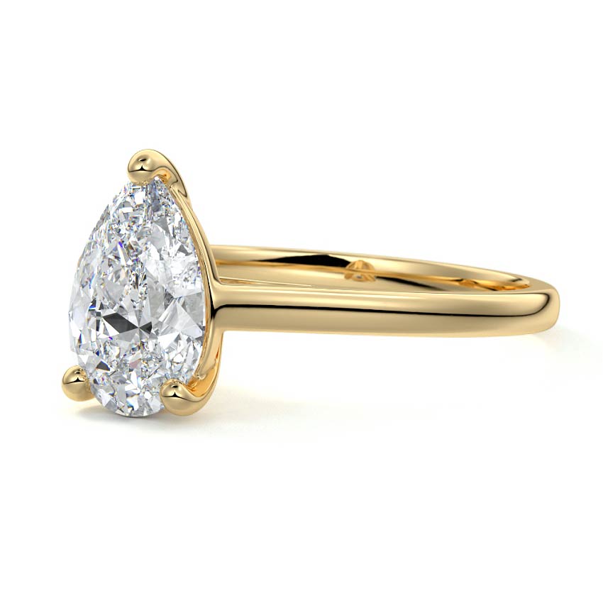 Yellow gold Pear Diamond Solitaire Engagement Ring with Cathedral Setting
