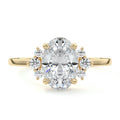 Yellow gold Oval Diamond Side Stone Engagement Ring with Floral Round Cluster Accents