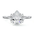 White gold Pear Diamond Side Stone Engagement Ring with Floral Round Cluster Accents