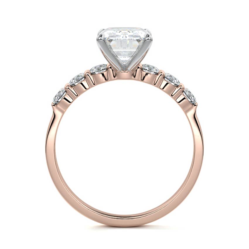 Rose gold Emerald Diamond Engagement Ring with Graduated Side Stones and Prong Setting