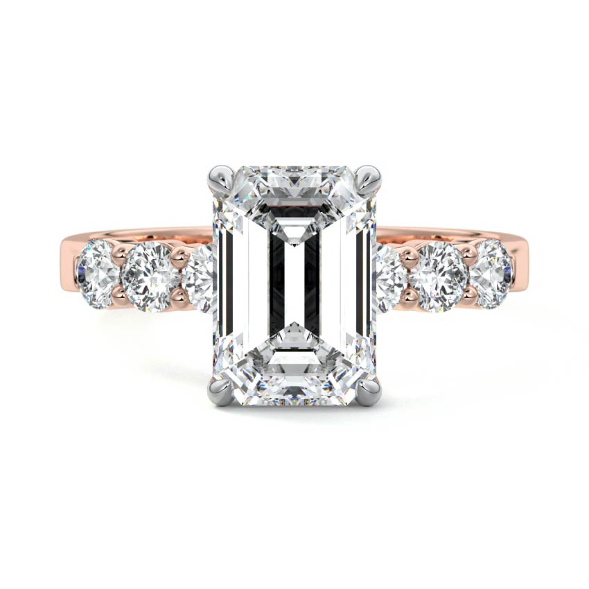 Rose gold Emerald Diamond Engagement Ring with Graduated Side Stones and Prong Setting