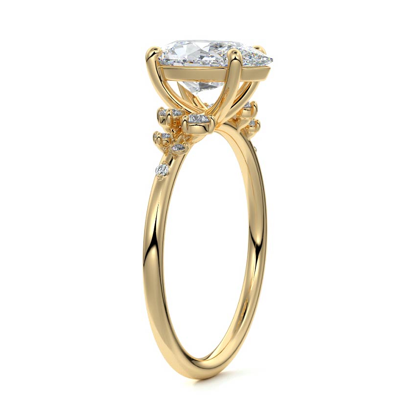 Yellow gold Pear Diamond Side Stone Engagement Ring with Clustered Round Accents