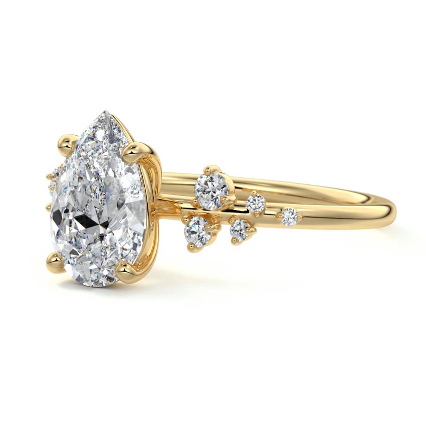 Yellow gold Pear Diamond Side Stone Engagement Ring with Clustered Round Accents
