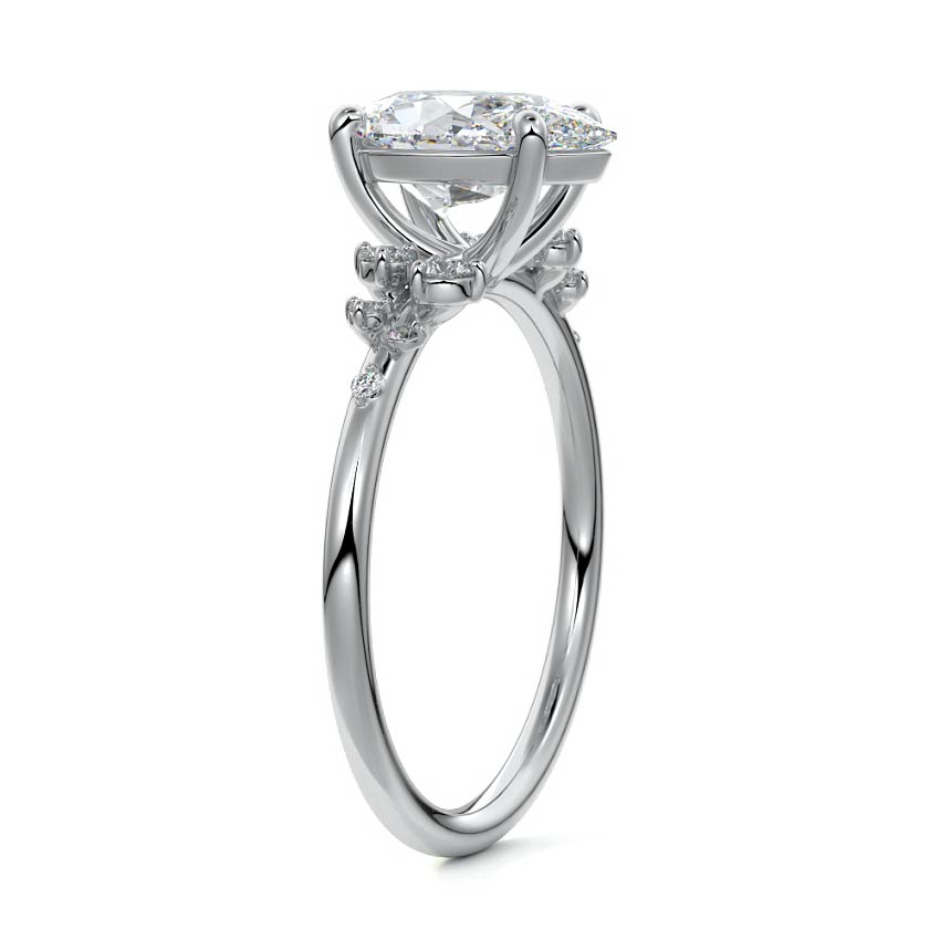 Silver Pear Diamond Side Stone Engagement Ring with Clustered Round Accents