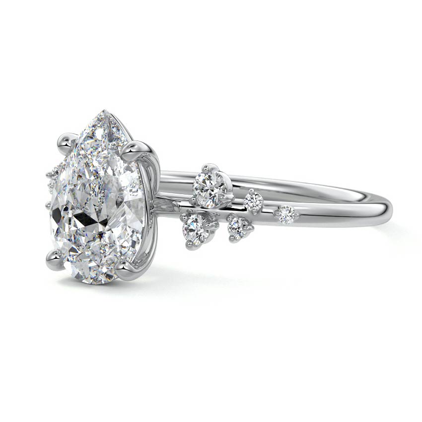Silver Pear Diamond Side Stone Engagement Ring with Clustered Round Accents