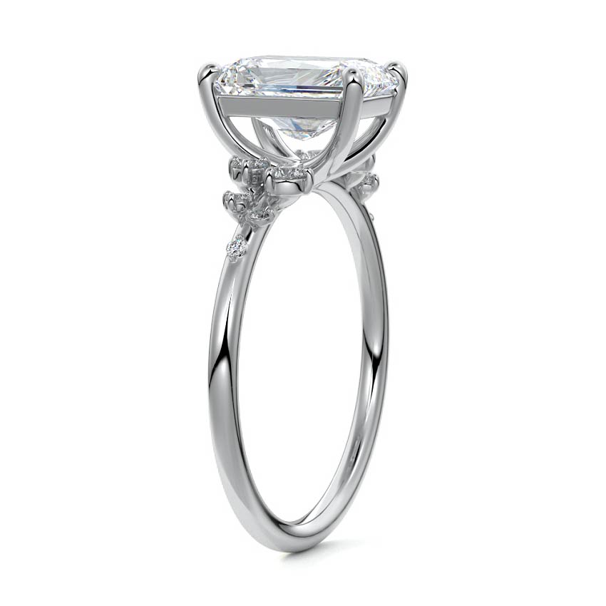 Platinum Radiant Diamond Side Stone Engagement Ring with Clustered Round Accents