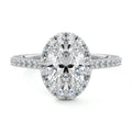 White gold Oval Diamond Halo Engagement Ring with Round Accents