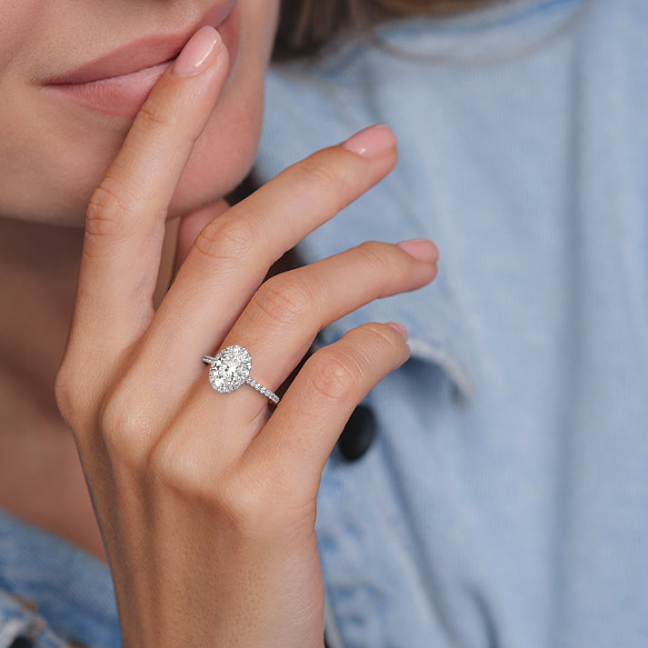 White gold Oval Diamond Halo Engagement Ring with Round Accents