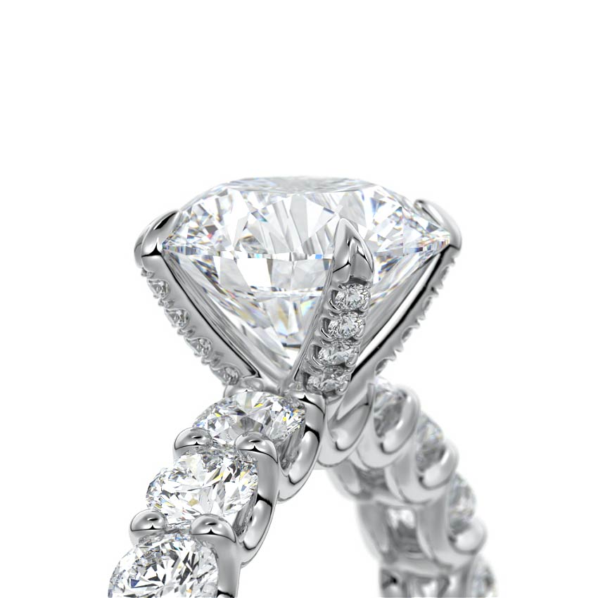 Platinum Round Diamond Engagement Ring with Prong Setting and Pave Band
