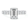 Platinum Emerald Diamond Engagement Ring with Prong Setting and Pave Band