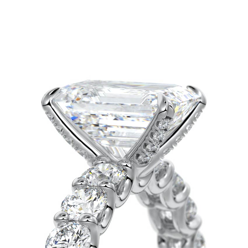 Platinum Emerald Diamond Engagement Ring with Prong Setting and Pave Band