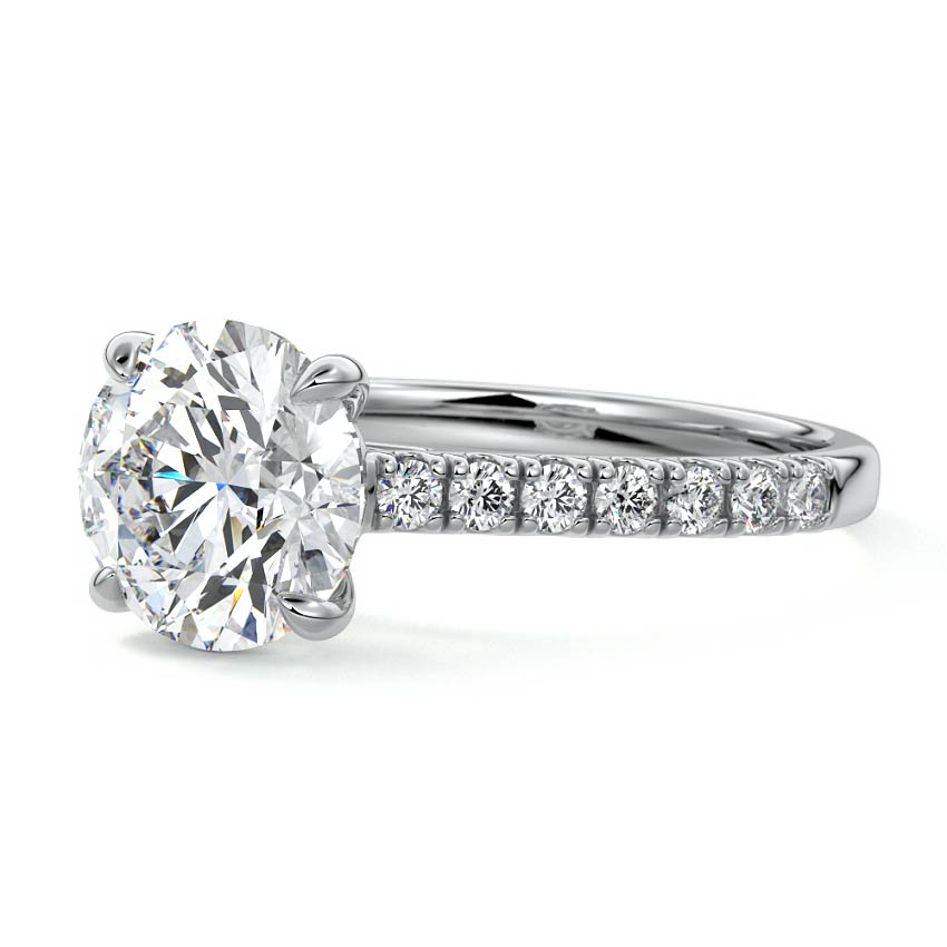 Platinum Round Diamond Engagement Ring with Pavé Band and Prong Setting