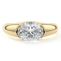 Yellow gold Oval Diamond Solitaire Engagement Ring with Bezel-Inspired Setting