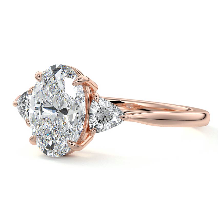 Rose gold Three-Stone Oval Diamond Ring with Trillion Side Stones