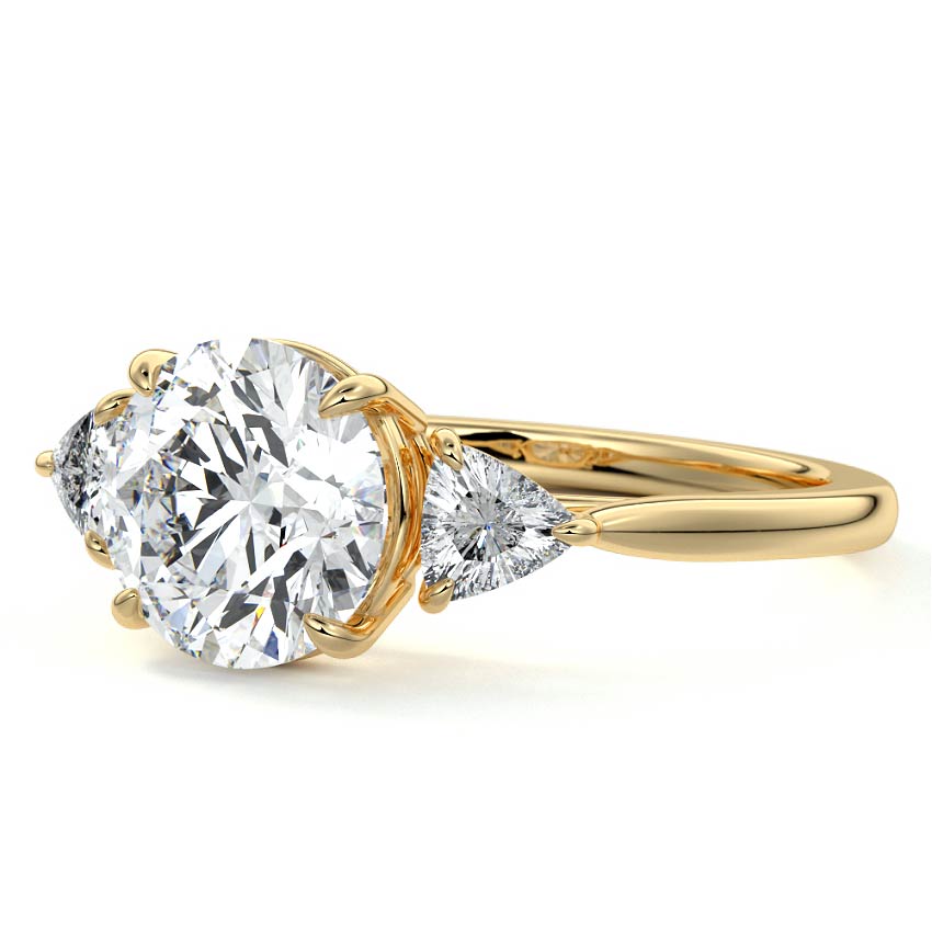 Yellow gold Three-Stone Round Diamond Ring with Trillion Side Stones