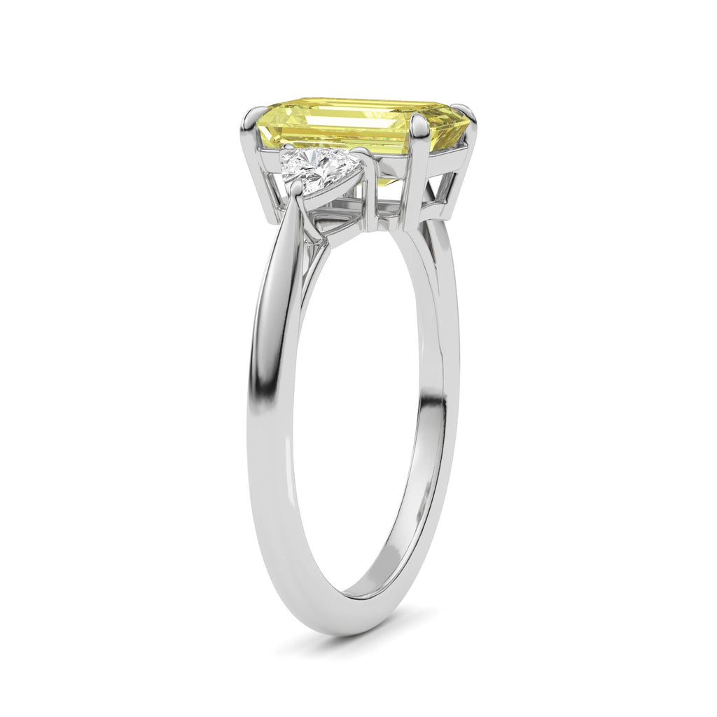 Yellow gold Three-Stone Fancy Yellow Emerald Cut Diamond Ring with Trillion Side Stones