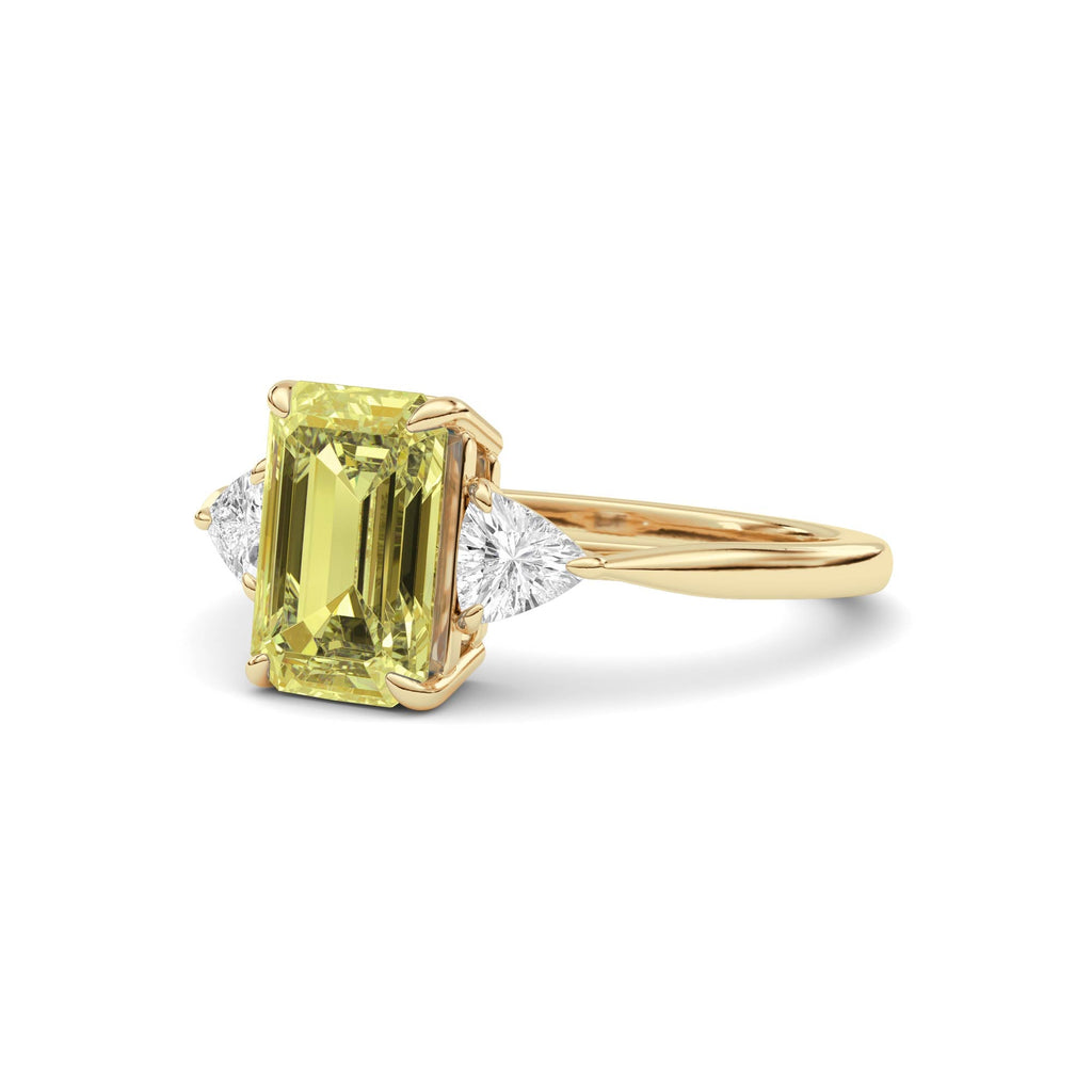 Yellow gold Three-Stone Fancy Yellow Emerald Cut Diamond Ring with Trillion Side Stones