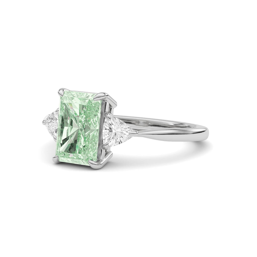 White gold Three-Stone Fancy Green Radiant Cut Diamond Ring with Trillion Side Stones