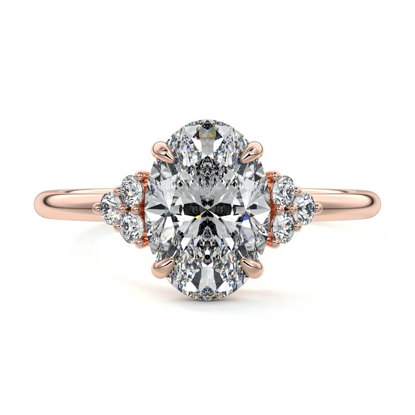 Rose gold Oval Diamond Side Stone Engagement Ring