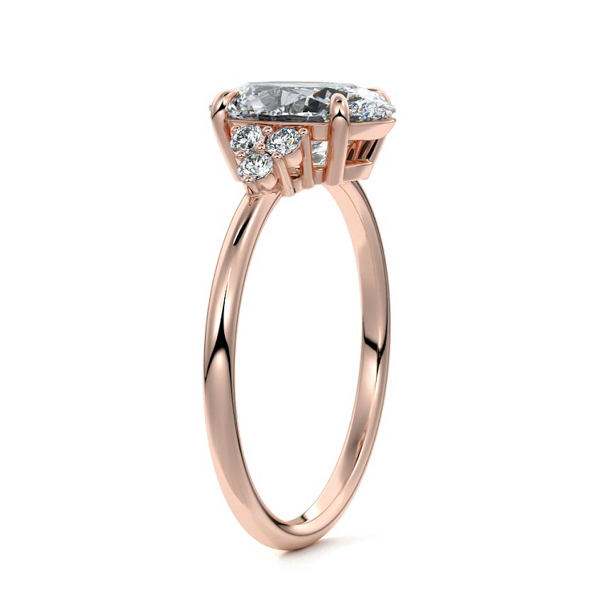 Rose gold Oval Diamond Side Stone Engagement Ring