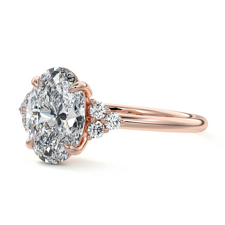 Rose gold Oval Diamond Side Stone Engagement Ring