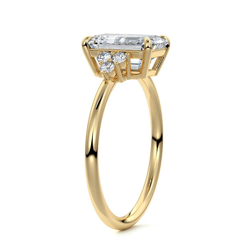 Yellow gold Emerald Diamond Side Stone Engagement Ring