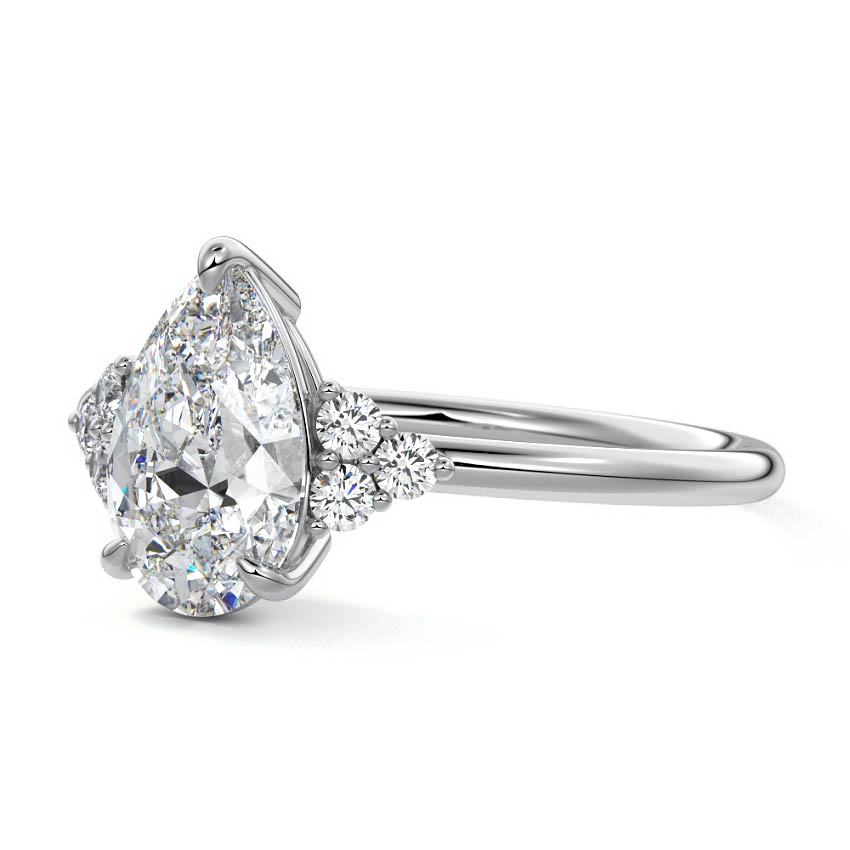 Platinum Pear Diamond Side Stone Engagement Ring