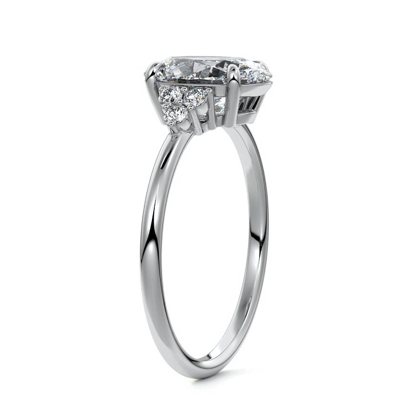 Platinum Oval Diamond Side Stone Engagement Ring