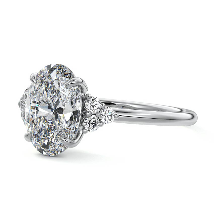 Platinum Oval Diamond Side Stone Engagement Ring