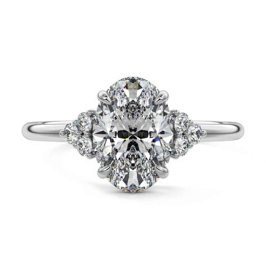 Platinum Oval Diamond Side Stone Engagement Ring