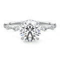 Platinum Round Diamond Engagement Ring with Prong Setting and Hidden Halo