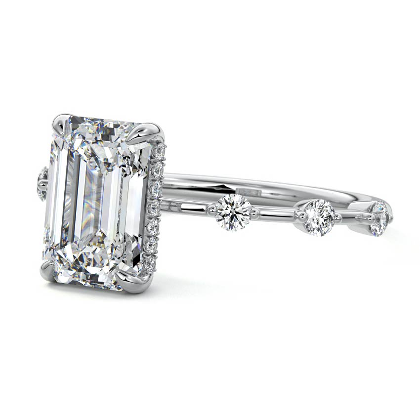 Platinum Emerald Diamond Engagement Ring with Prong Setting and Hidden Halo
