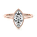 Rose gold Marquise Diamond Solitaire Engagement Ring with Milgrain Bezel Setting