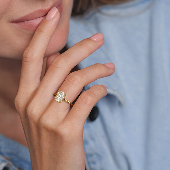 Yellow gold Radiant Diamond Solitaire Engagement Ring with Milgrain Bezel Setting