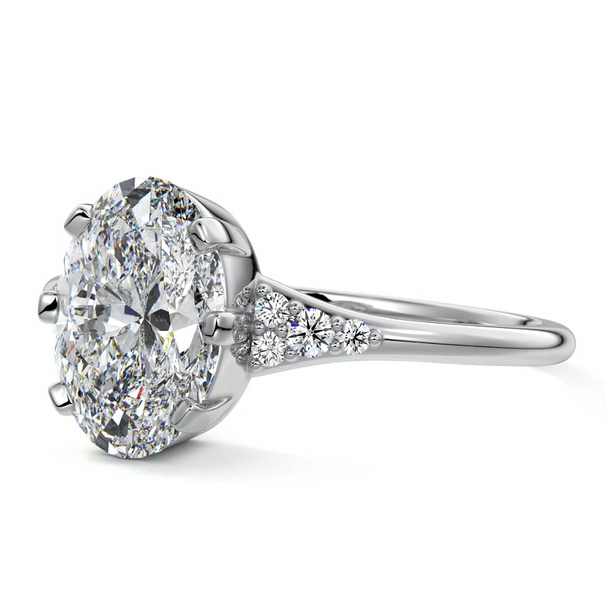 White gold Oval Diamond Engagement Ring with Side Stone Accents and Prong Setting