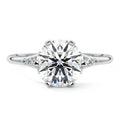 Platinum Round Diamond Engagement Ring with Side Stone Accents and Prong Setting