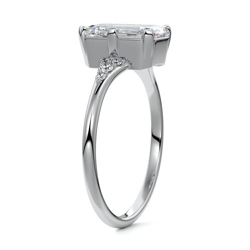Platinum Emerald Diamond Engagement Ring with Side Stone Accents and Prong Setting